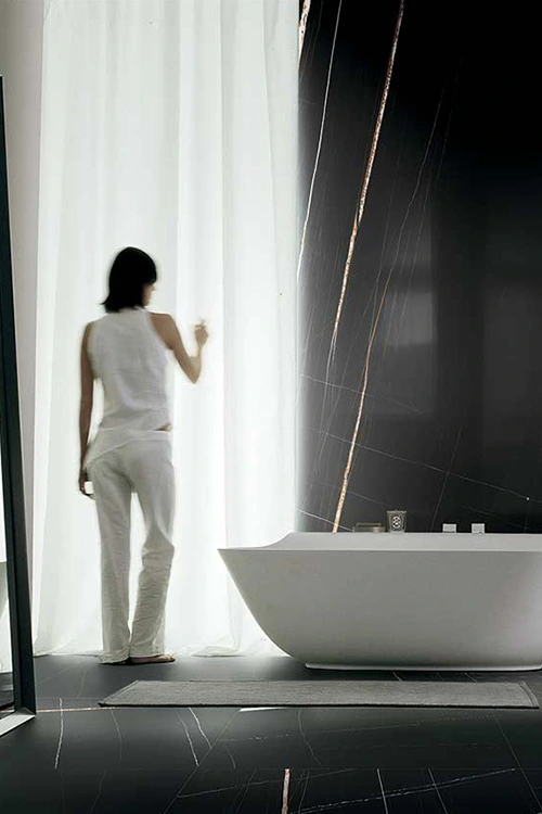 Transform your bathroom into a luxurious oasis with Royal Ceramic's porcelain tiles.